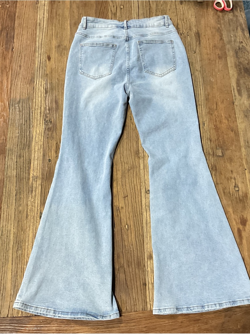 Light Blue High-Rise Flare Jeans with Knee Bow Carpenter Detail - Picture 6 of 11